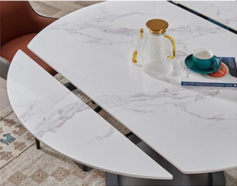 Table de salle à manger design plateau en pierre frittée noir et pieds en acier coloris noir L.130 x P.90 x H.75 cm collection FLORIDE